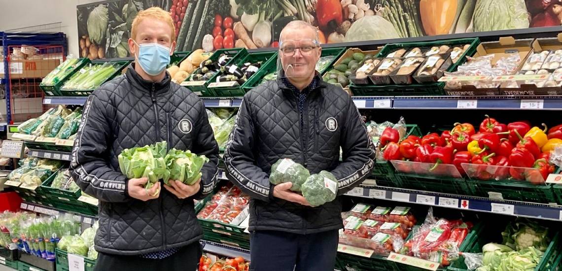 Inside shop with grocers